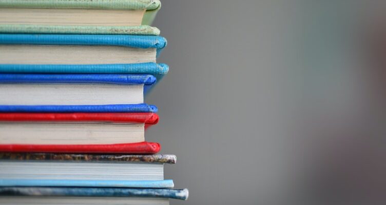 shallow focus photography of books